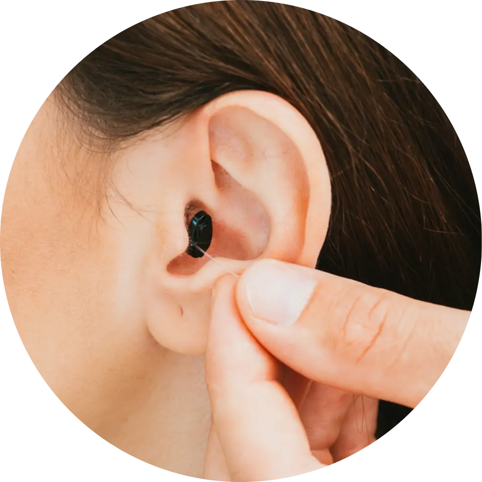 Invisible hearing aid placed in ear
